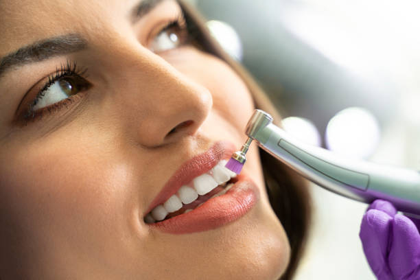 close-up shot of a woman during a professional dental cleaning