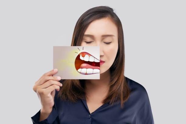 woman with inflamed gums